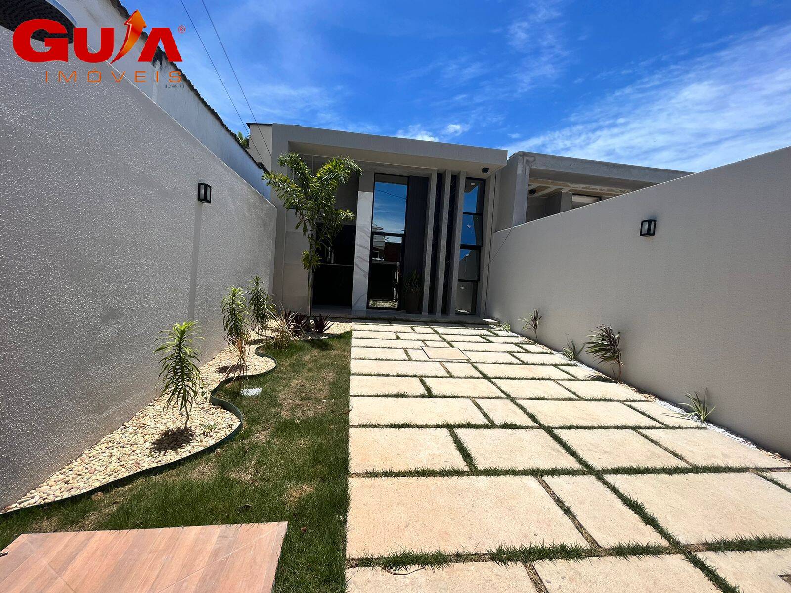 Casa à venda com 3 quartos, 100m² - Foto 1